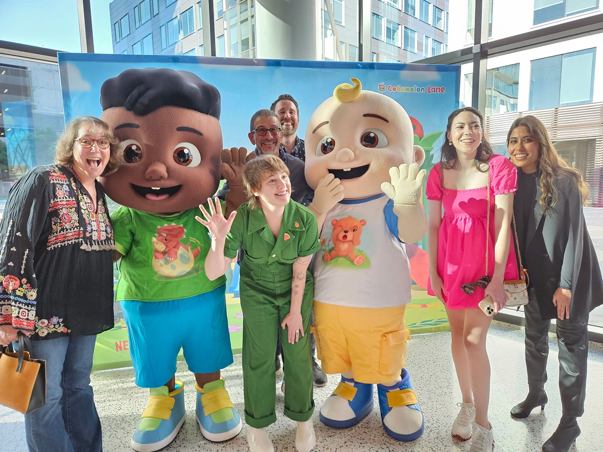 Cody and JJ from CoComelon pose with fans at a live meet and greet